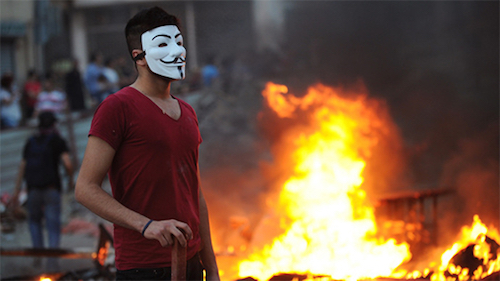 Thomas Frey Futurist Speaker Protester in Turkey wearing a Guy Fawkes mask