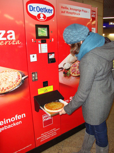 Thomas Frey Futurist Speaker Pizza vending machine, 9" pizzas cook in 2 minutes while you wait
