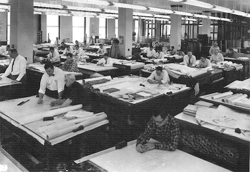 Thomas Frey Futurist Speaker Automotive engineers working at a car factory in the 1950s