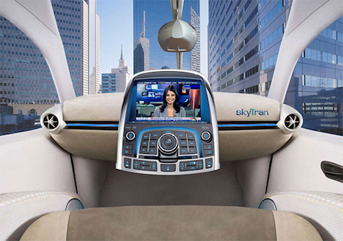 Thomas Frey Futurist Speaker Riding inside a SkyTran capsule